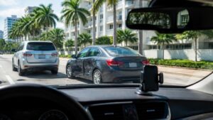 Rideshare vehicle involved in an accident on a South Florida city street.