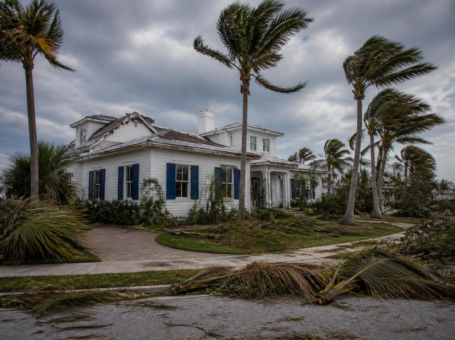 Hurricane-damaged West Palm Beach home illustrating how a Florida hurricane deductible affects a property insurance claim